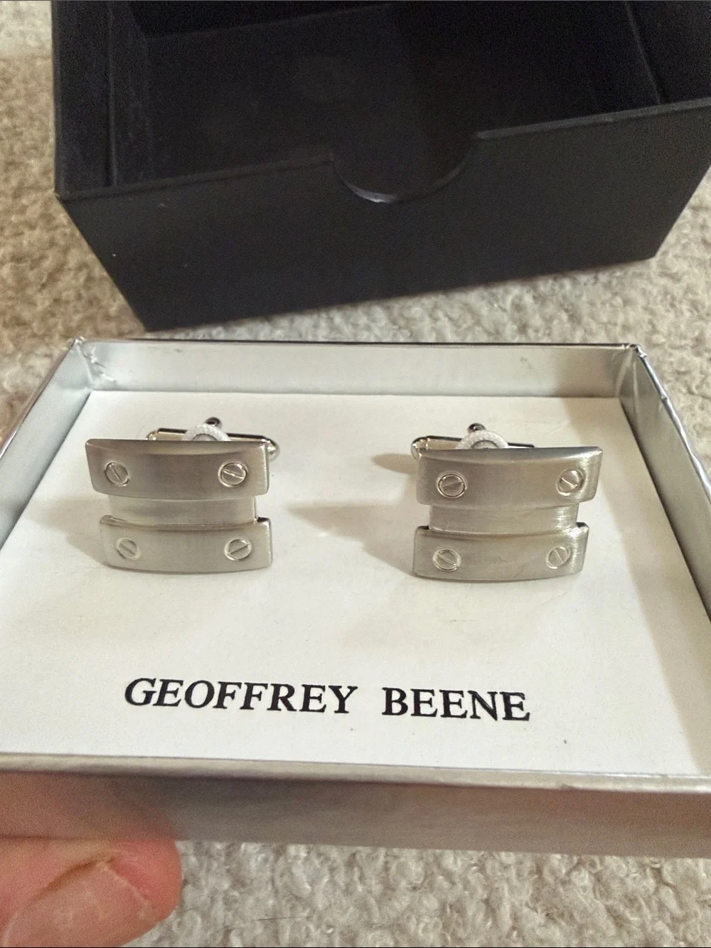 Geoffrey Beene polished silver